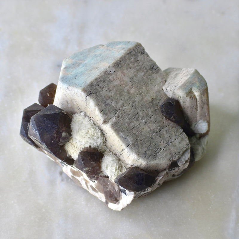 Amazonite, smoky & clevelandite cluster with large Carlsbad twin (CH-A-26)
