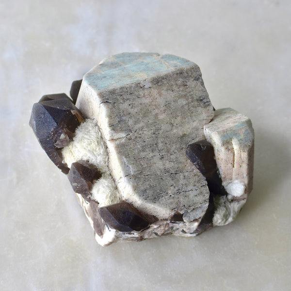 Amazonite, smoky & clevelandite cluster with large Carlsbad twin (CH-A-26)